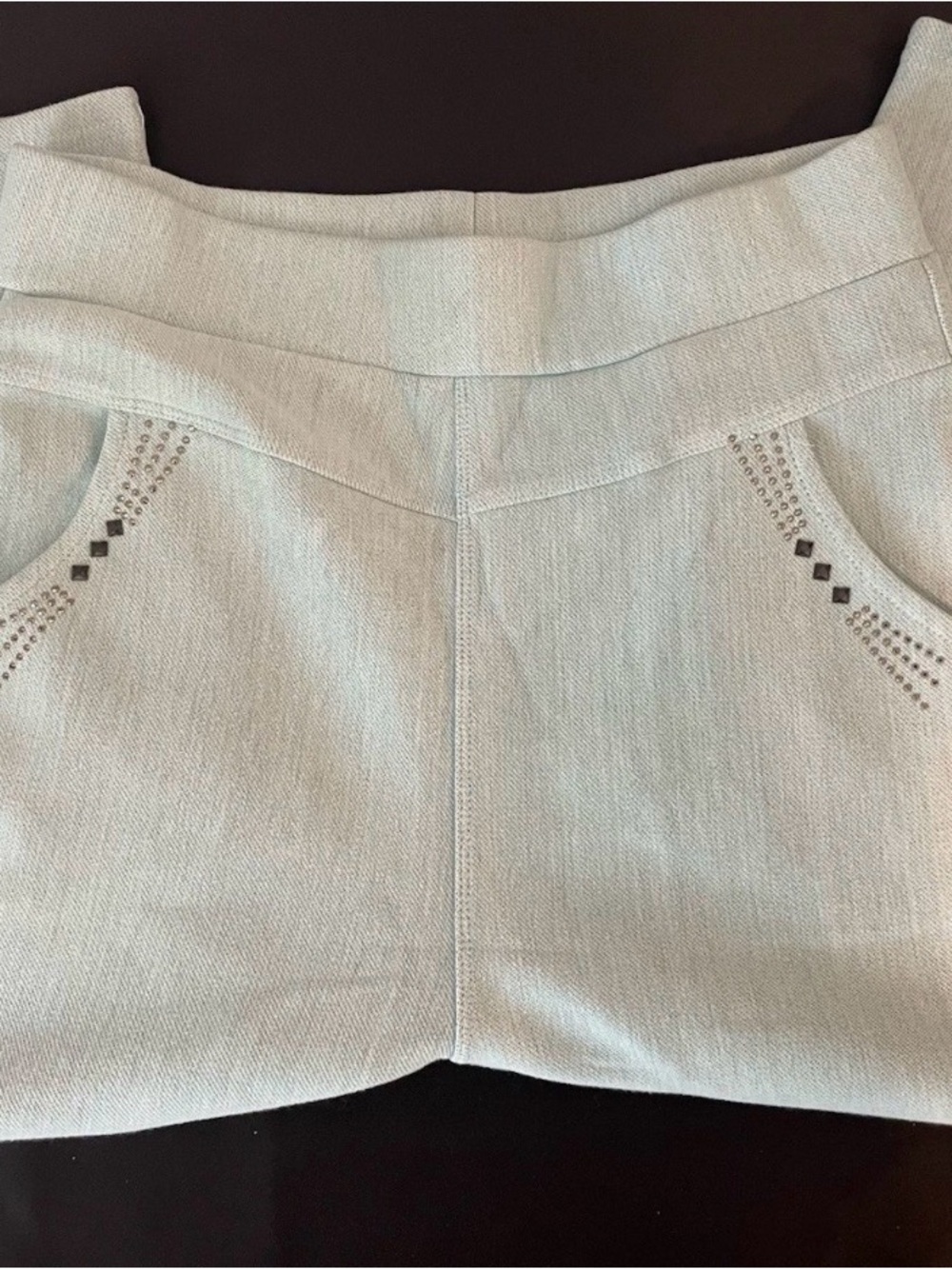 Light teal green polyester spandex capris with Studded Pocket Detail